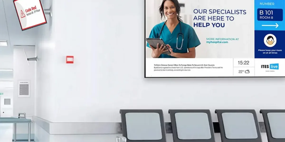 Narrowcasting screen on the wall of a hospital waiting room